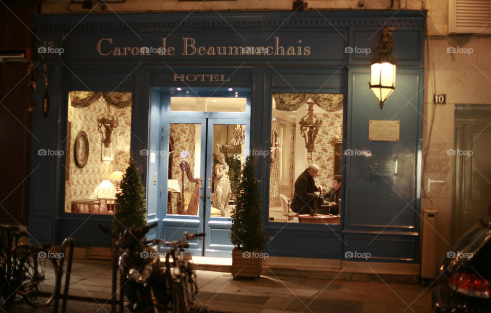 night in Paris. idyllic old shop in Paris at night time