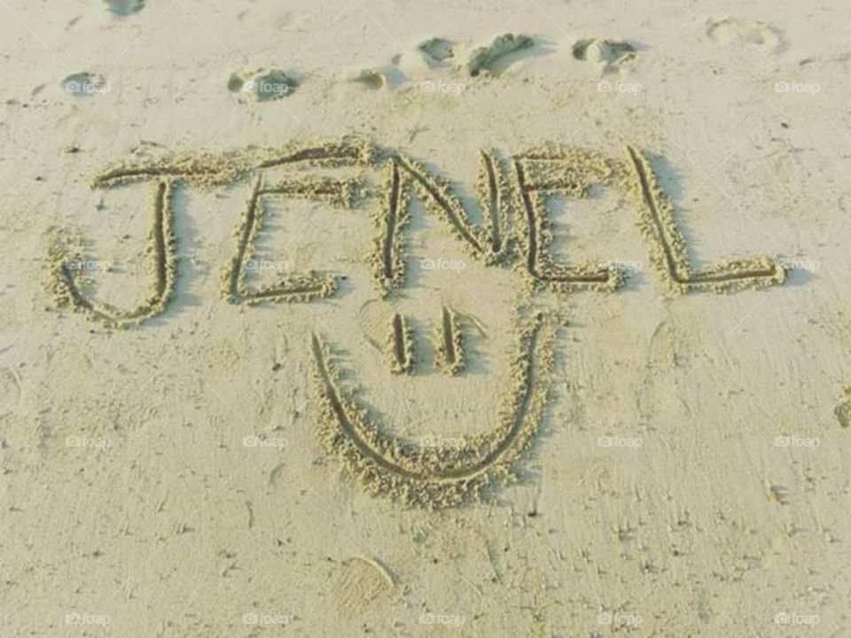 Write your name on the sand so the beach will always remember you.