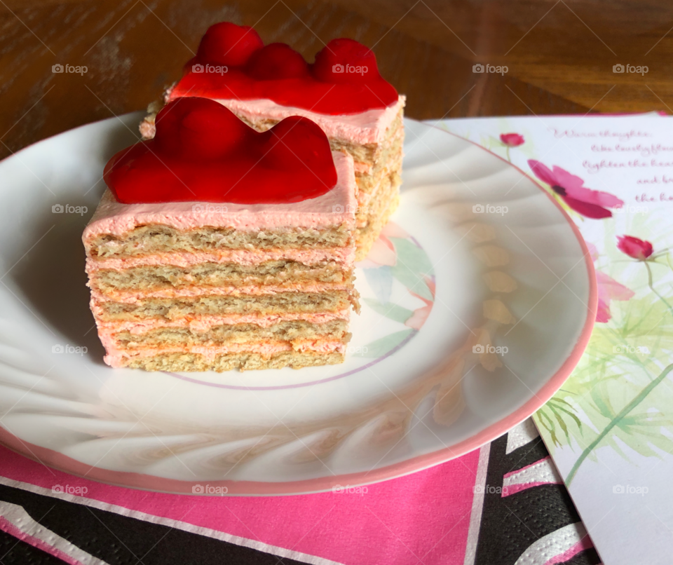 Lovely, layered  cake with cherries.