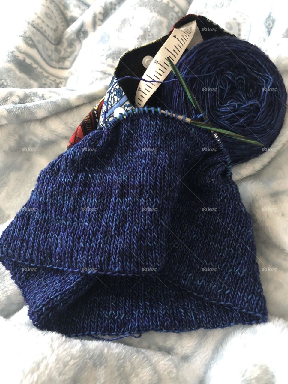 Deep blue knit hat in progress