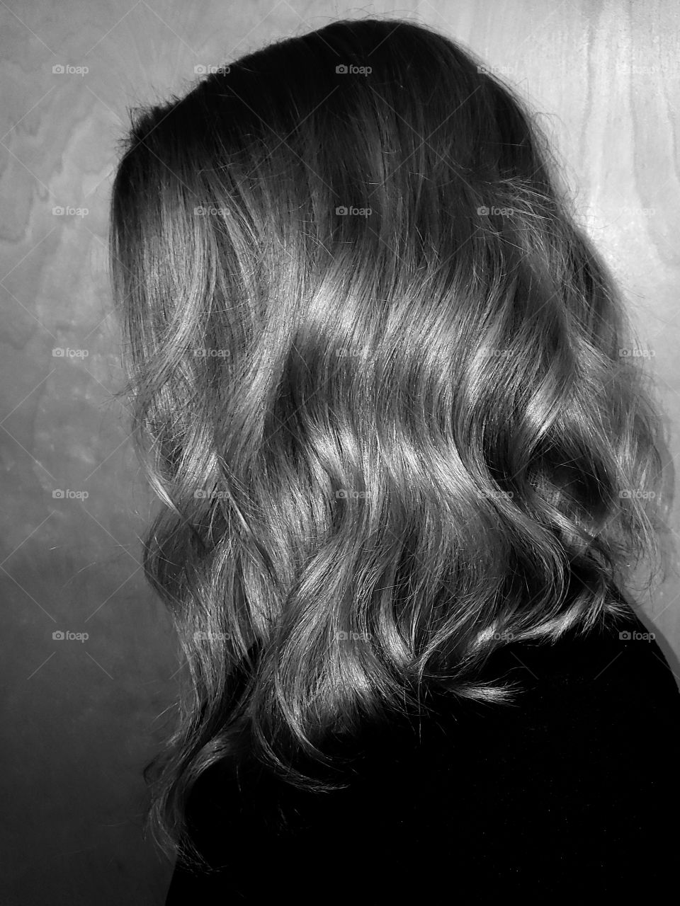 Black and white side portrait of hair, silhouette