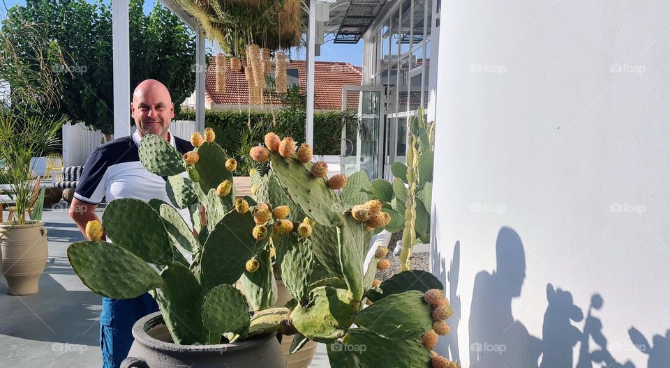my self next to prickly pears