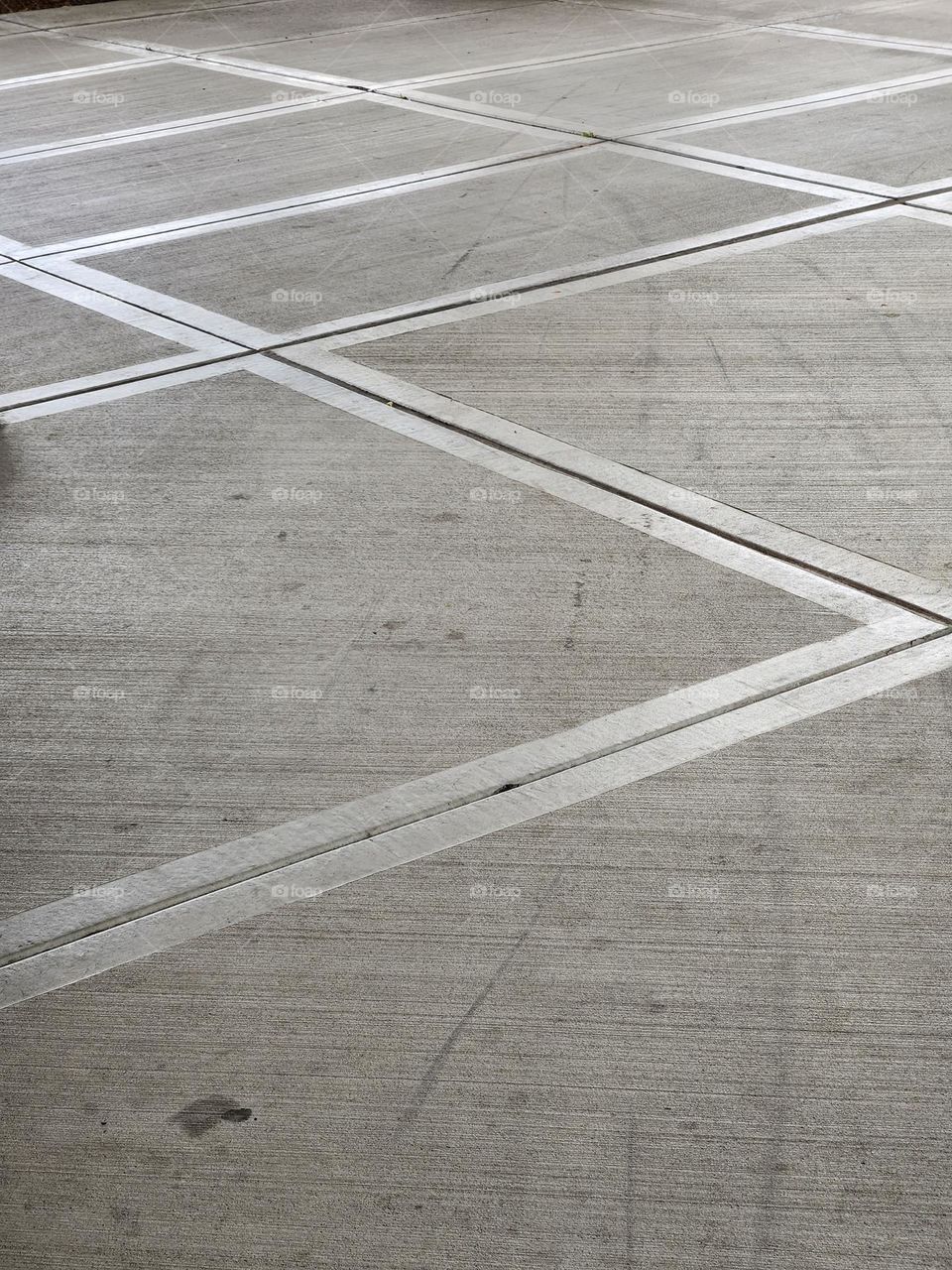 geometric design on urban cement walkway