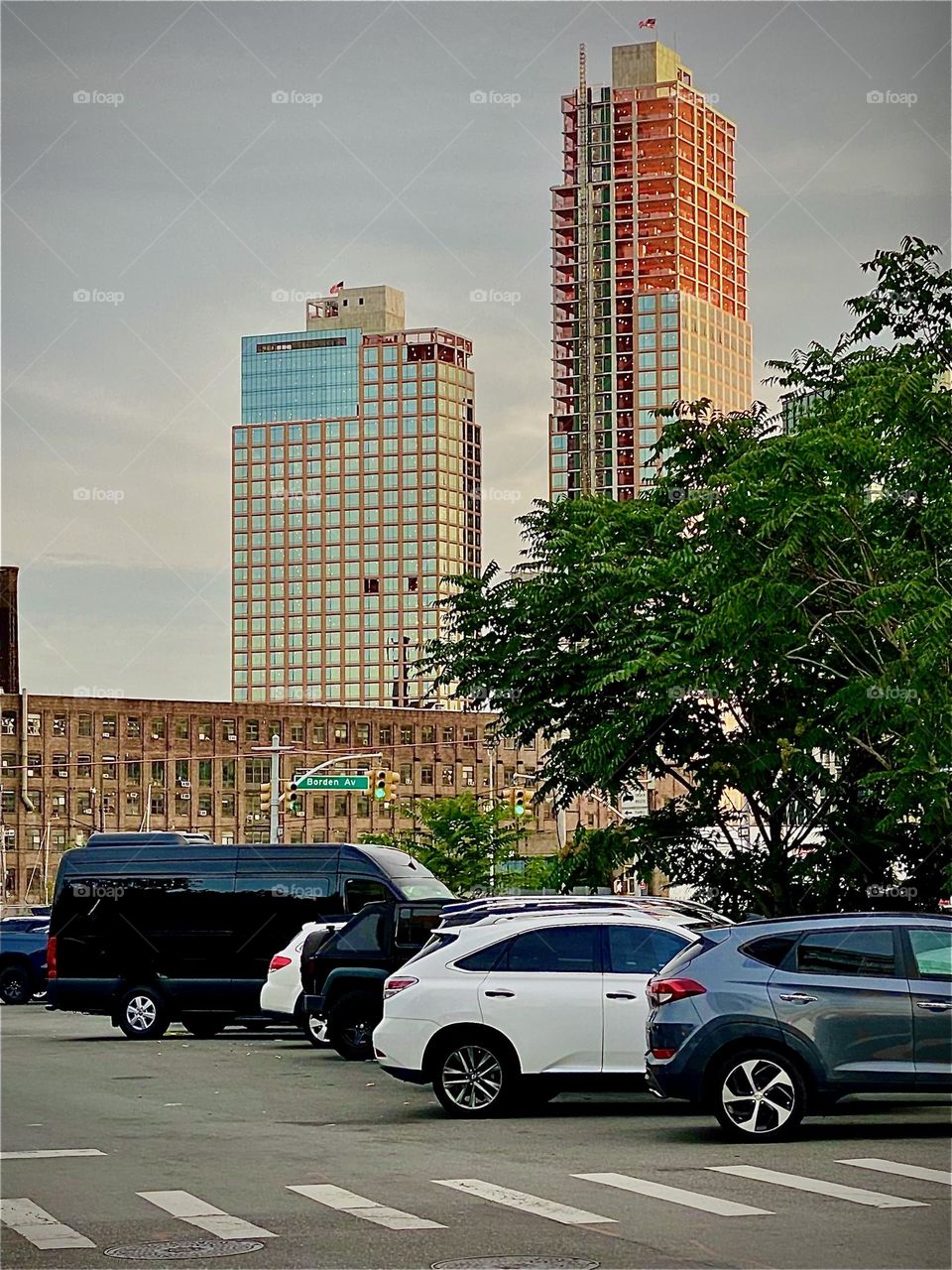 “Vernon Jackson Ave” at the corner of “Borden Ave” in LIC, Queens near the “Pulaski Bridge” and “Newtown Creek” on a hazy overcast early evening in the summer months of 2022. Hypnotic Productions