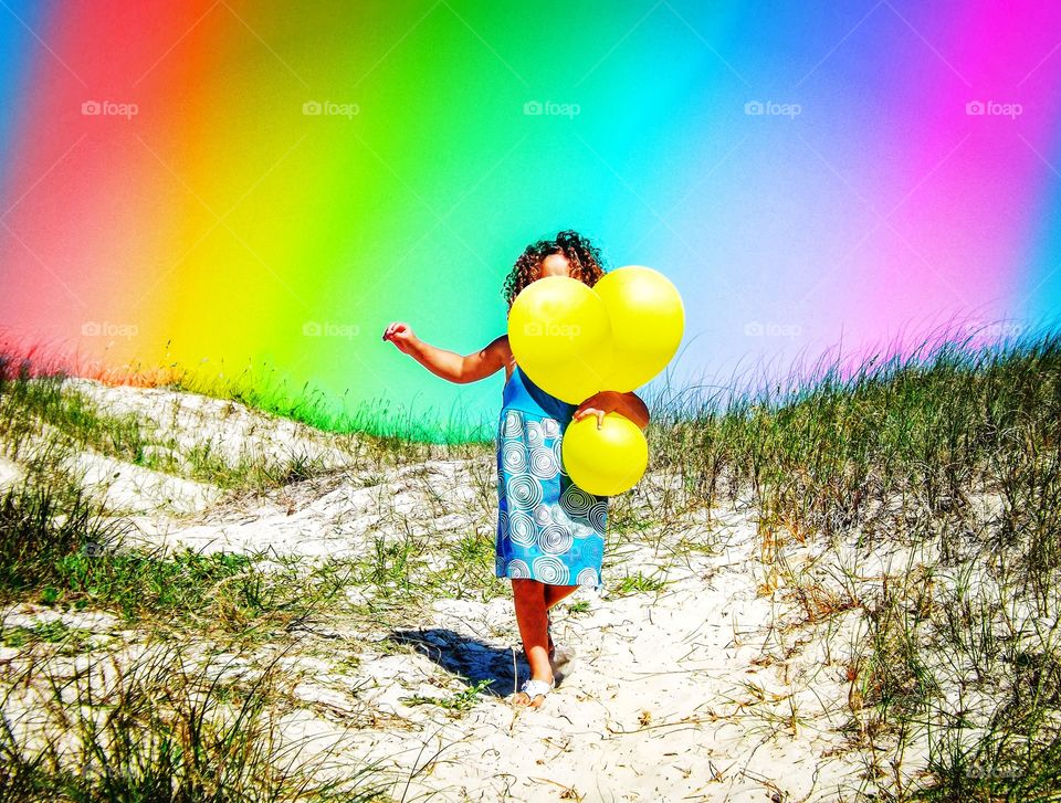 menina no arco-íris