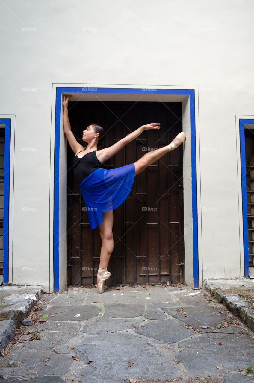 Young Female Ballerina Dancing Outside