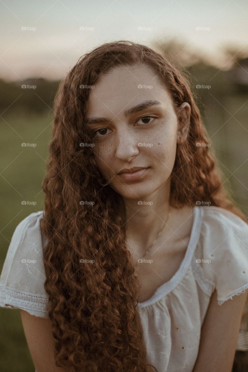 portrait of a girl in the field