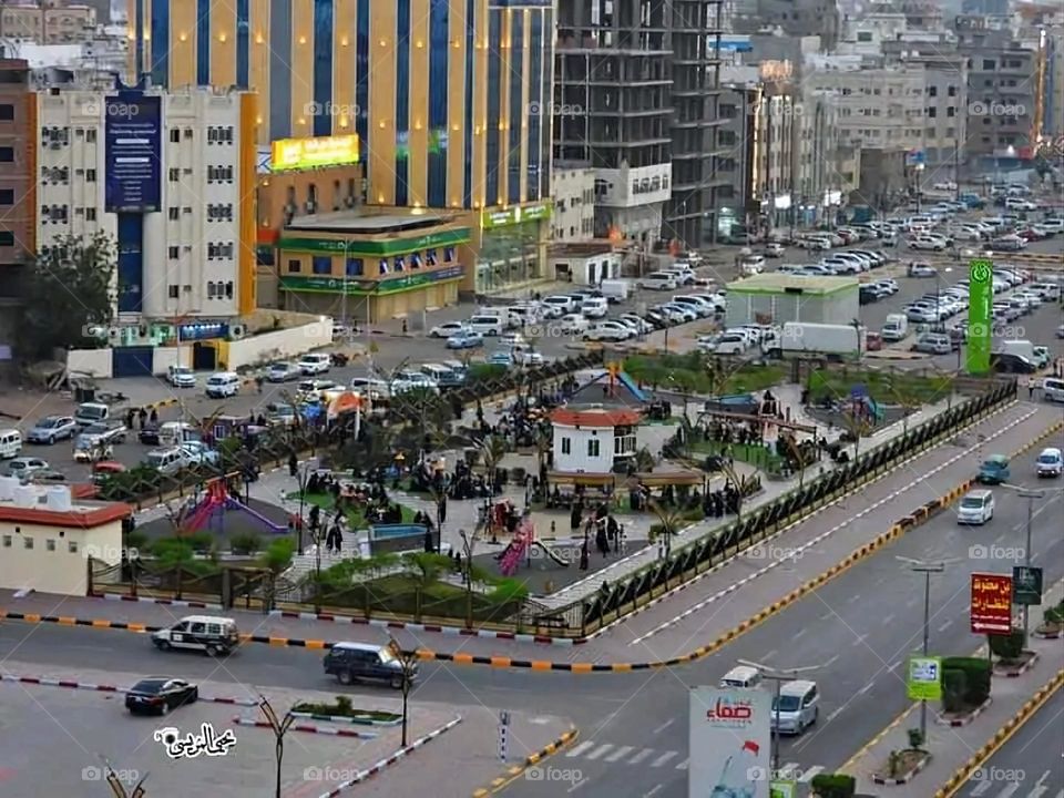 A very beautiful picture, and there is no better picture than it. There is no better picture of green herbs and colorful, red and white roses than it. Glory be to God, the natural and picturesque view, and there is no more
