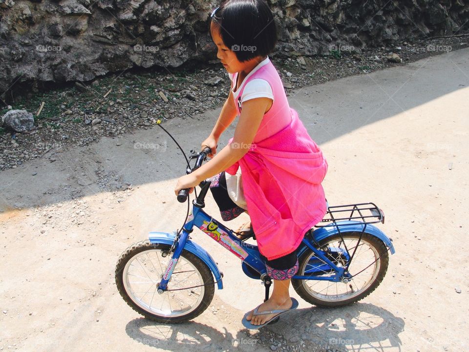 The girl and her bicycle