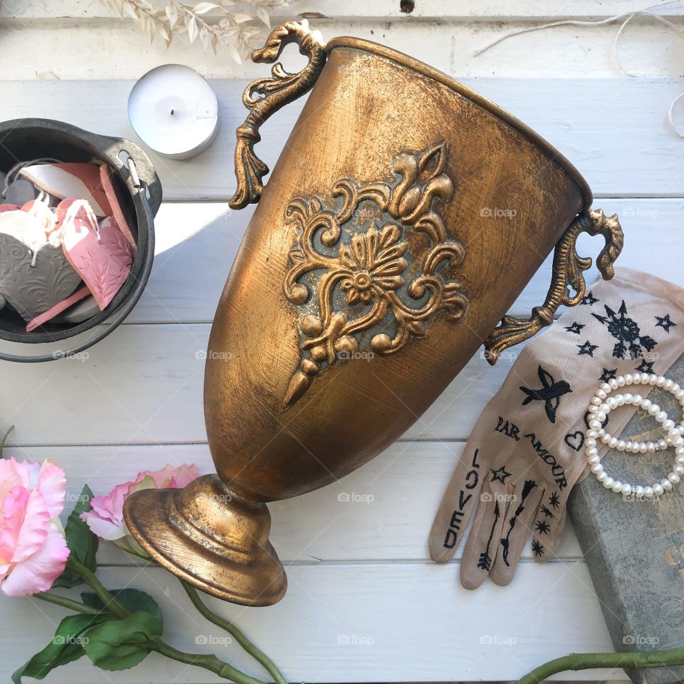 Big antique metal flower vase for flowers