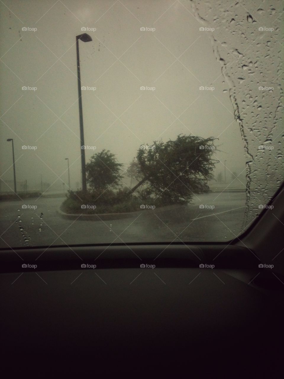 Stranded in the car as a storm rolls through bringing heavy rain and fast winds. 
