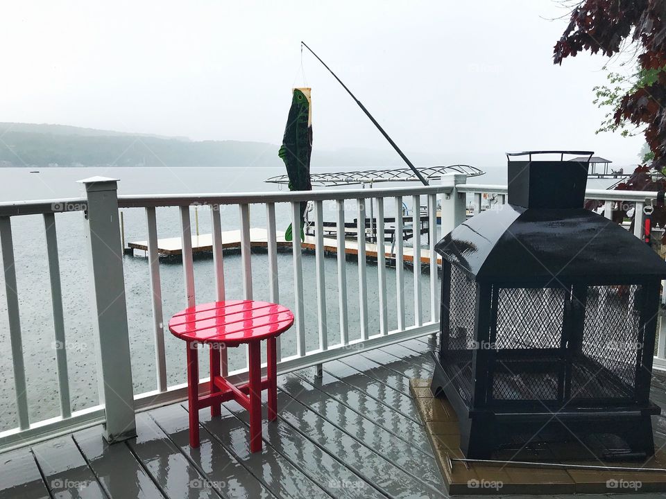 Red stool on the lake