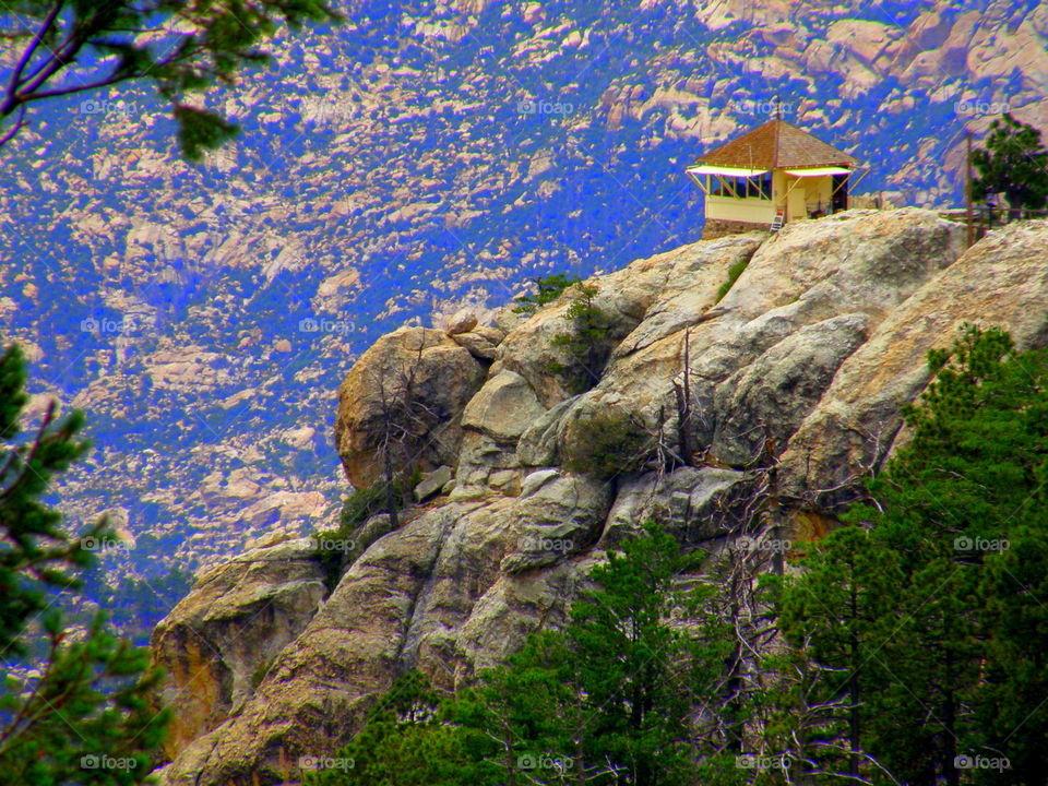 Isolation. review of a hut to the right Lemon Mountain , Tucson , Arizona. I believe it is a fire watch post.
