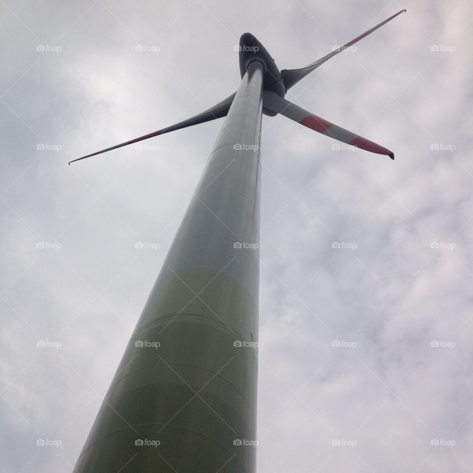 Sustainable Energy. Wind turbine (windmill) in the Black Forest, Germany, helps power the nearby town, which sells extra power to France