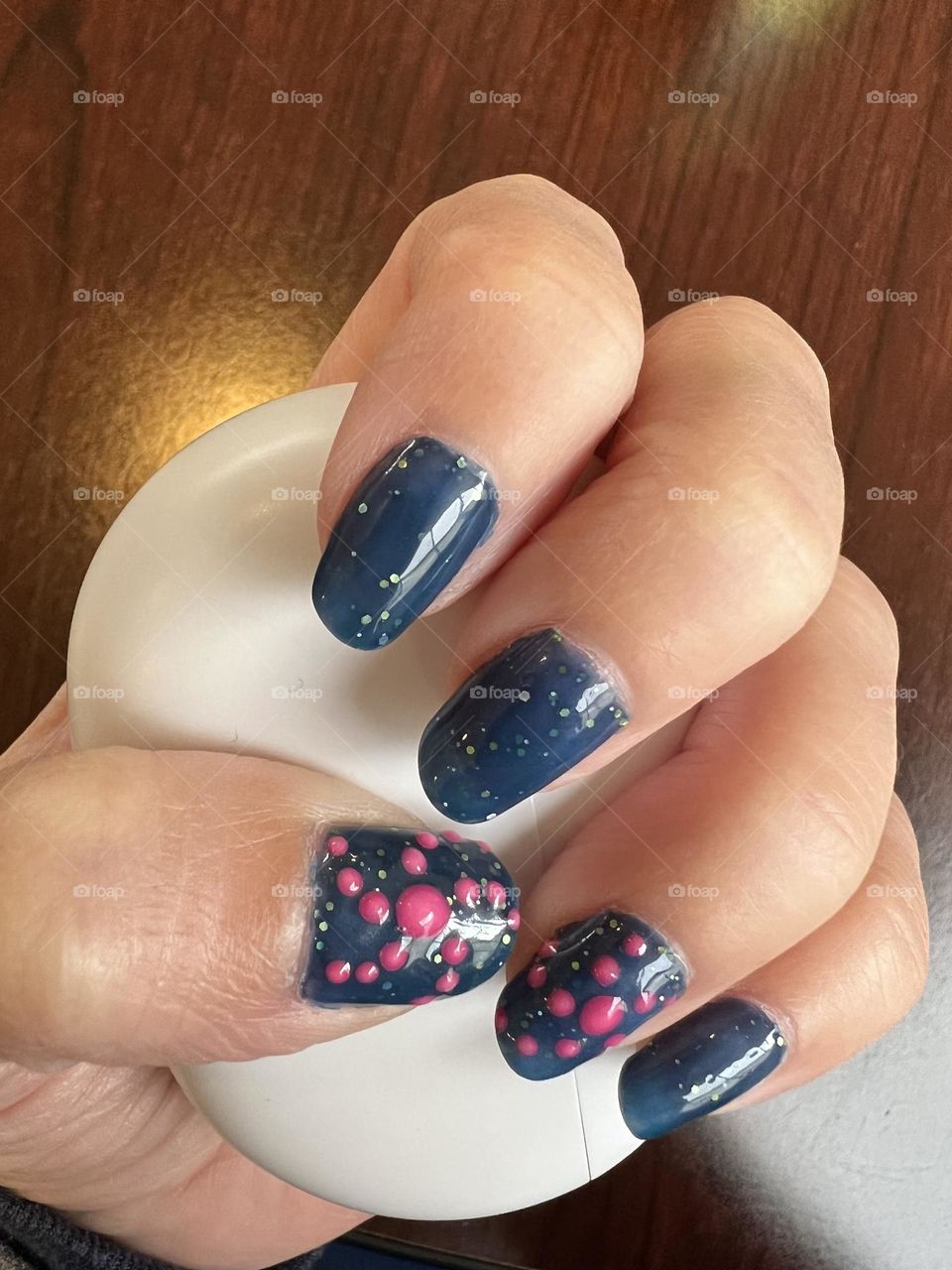 Pretty blue and pink sparkly color-changing gel nail polish manicure 