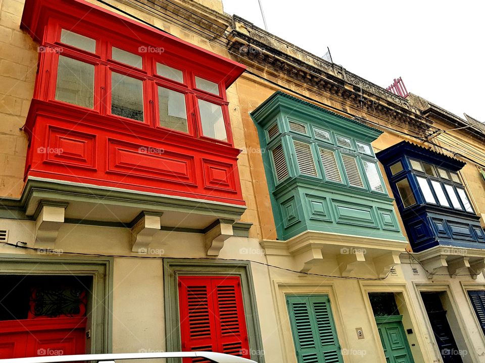 colourful closed balconies in malta