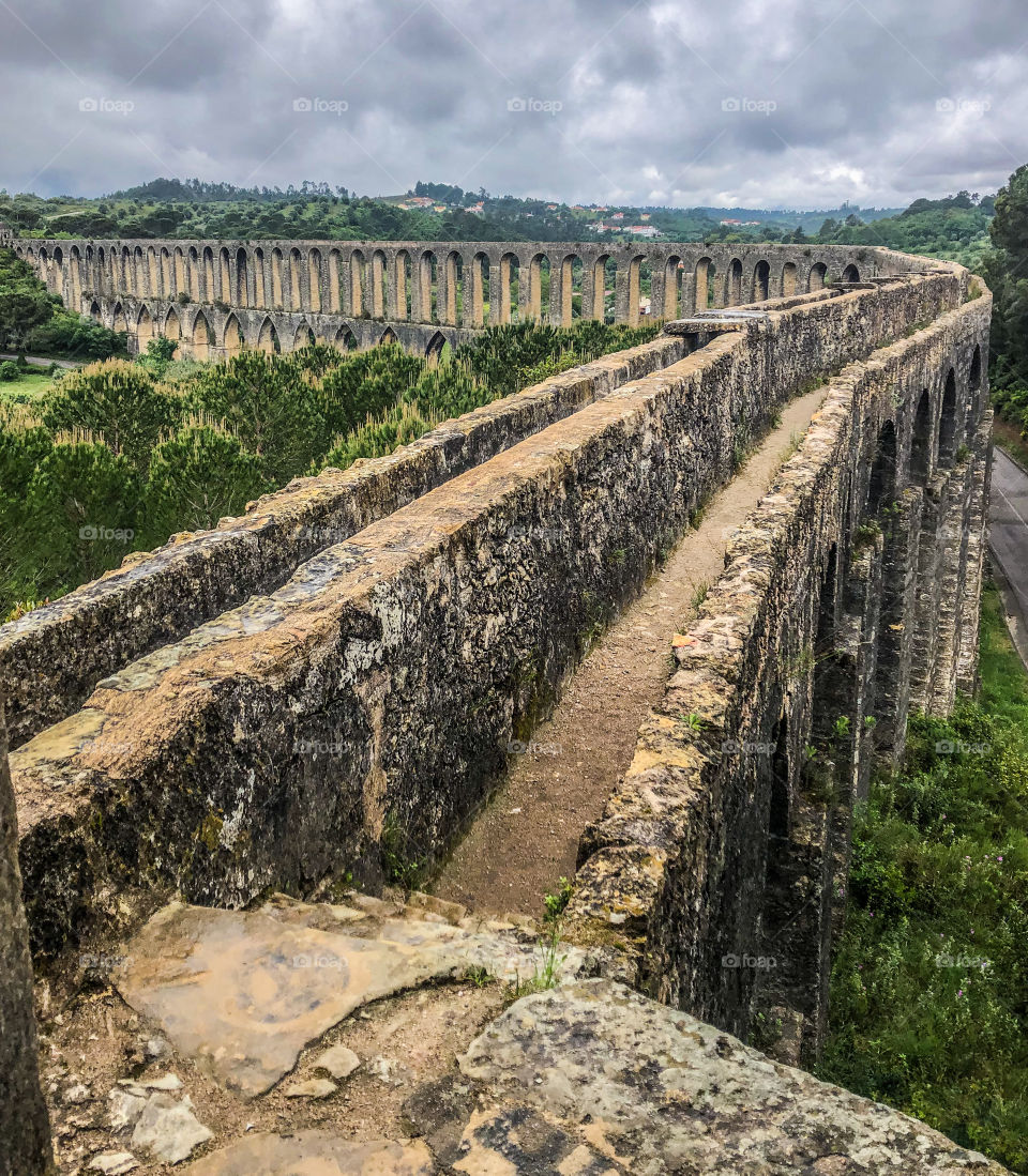 A long view of part of the 6 kilometre aqueduct of the Convento de Cristo built 1593-1614, Tomar, Portugal 2021