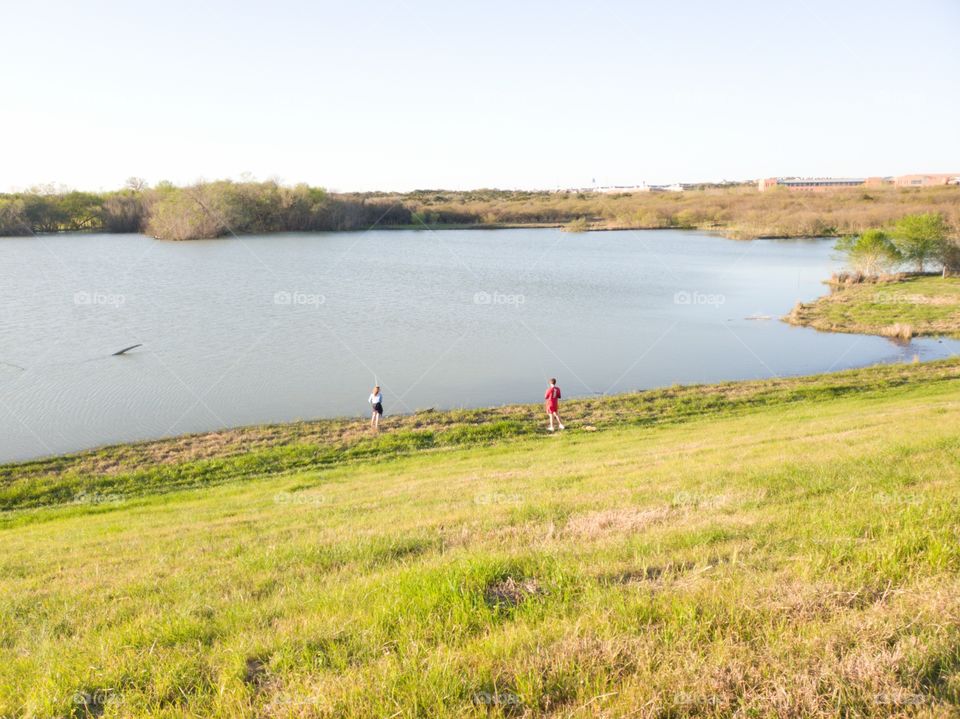 Couple fishing at city park