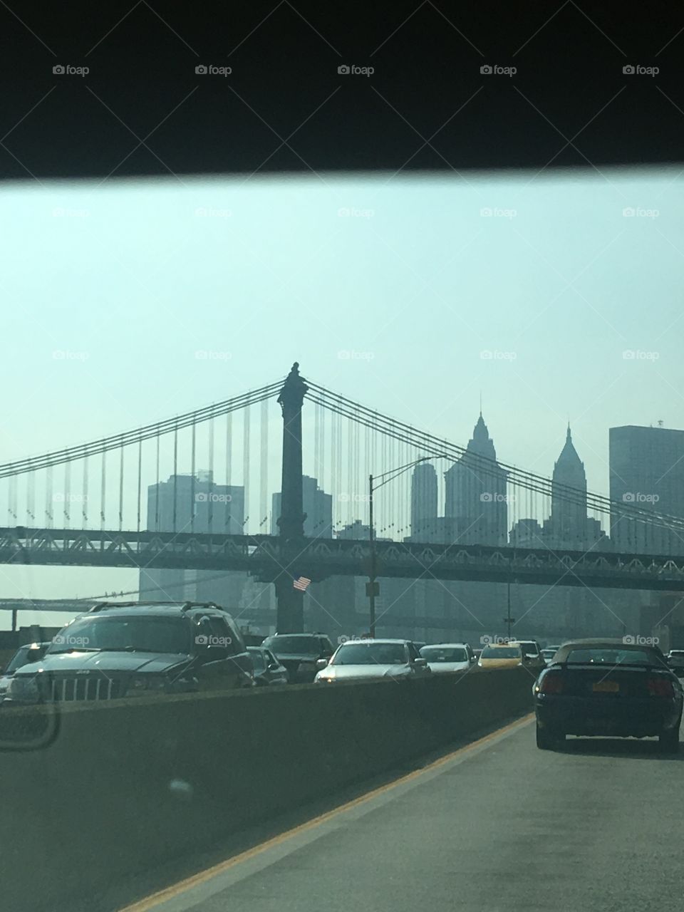 NYC east side highway- skyline, bridge, traffic