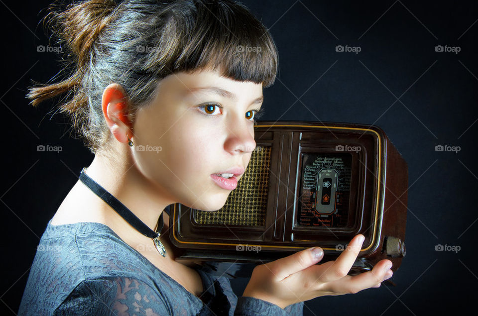 Girl With Old Radio