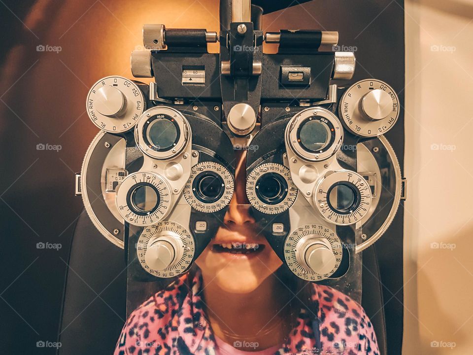Little girl at an optometrist