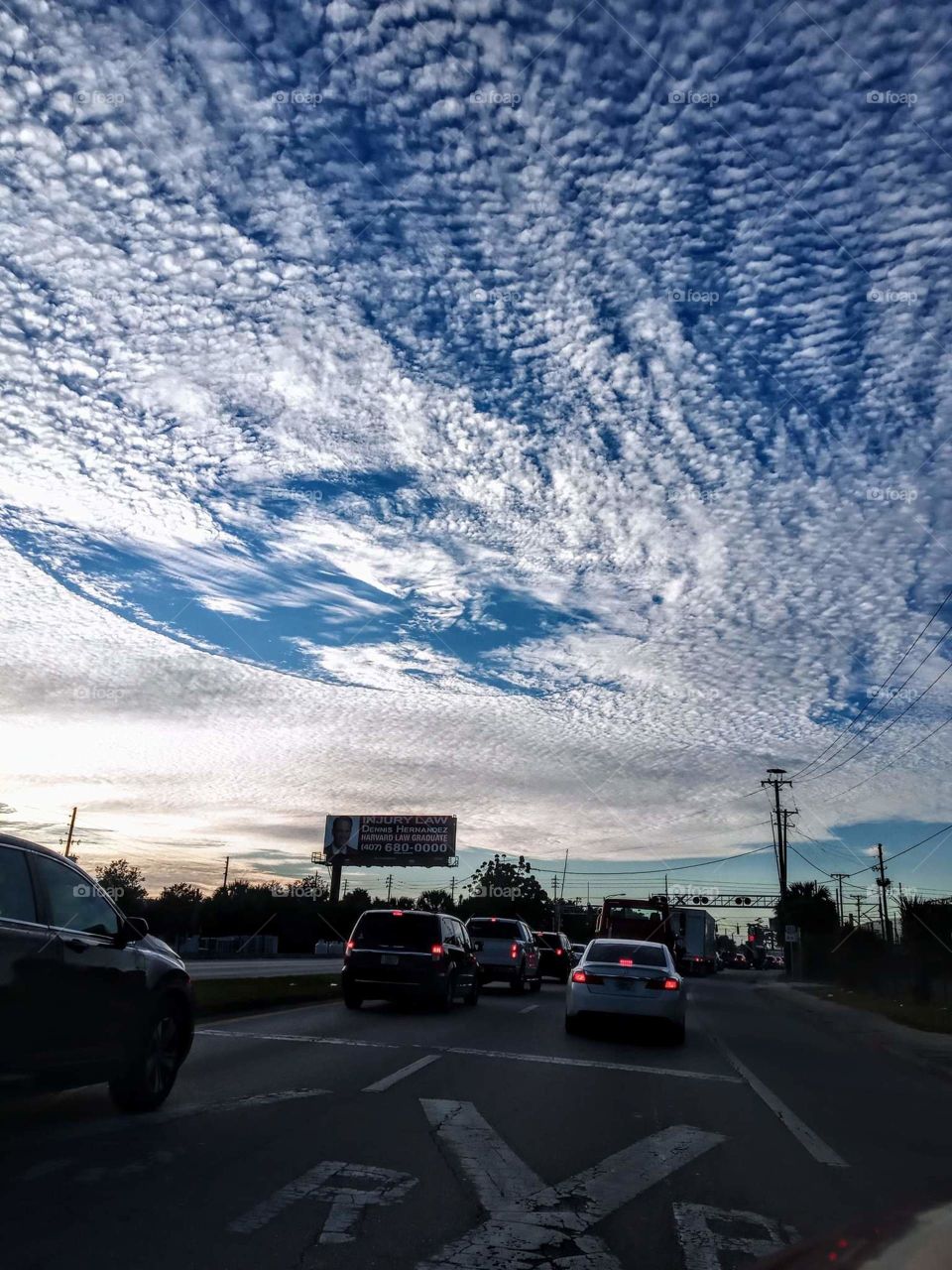 awesome cloud formations resembeling planet