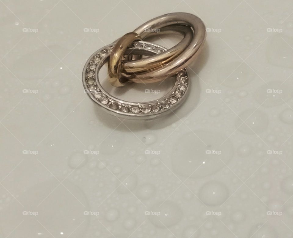 A pendant in water drops...