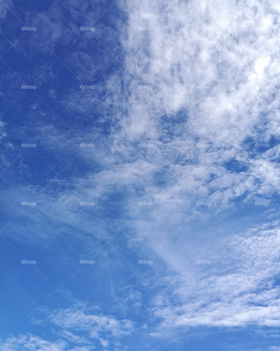 Background of beautiful blue sky with white clouds