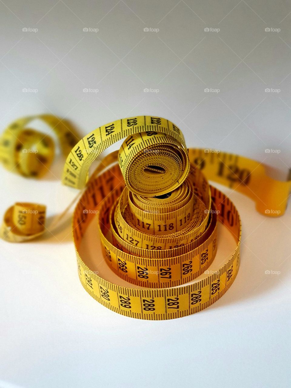 centimeter measuring tape in yellow