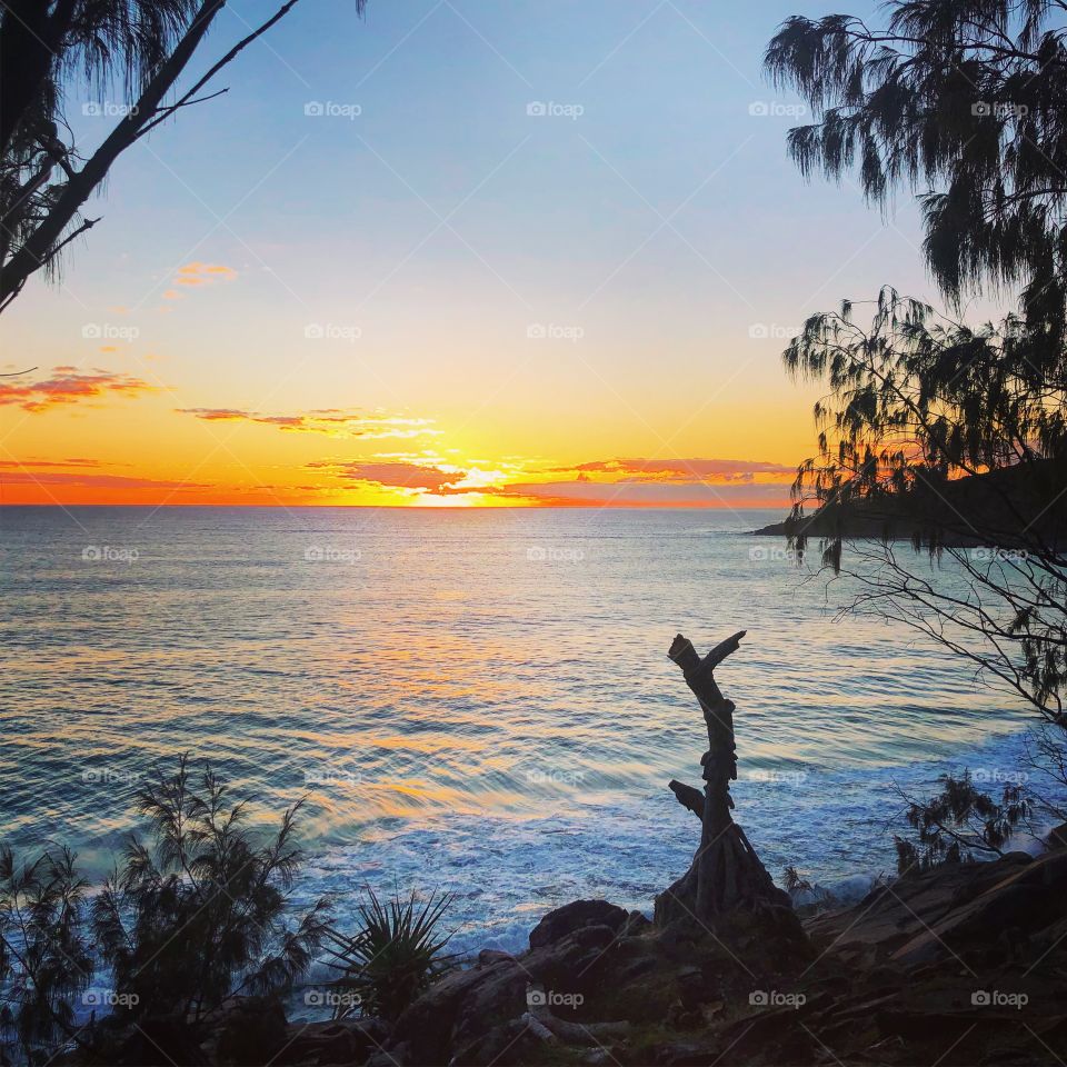 Sunrise over the sea in the tropical East coast of Australia 