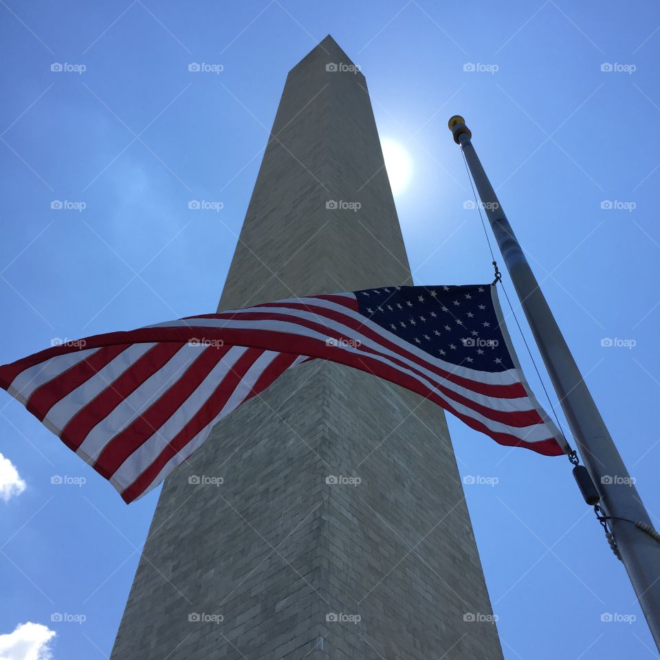 American flag with the Washington monument 