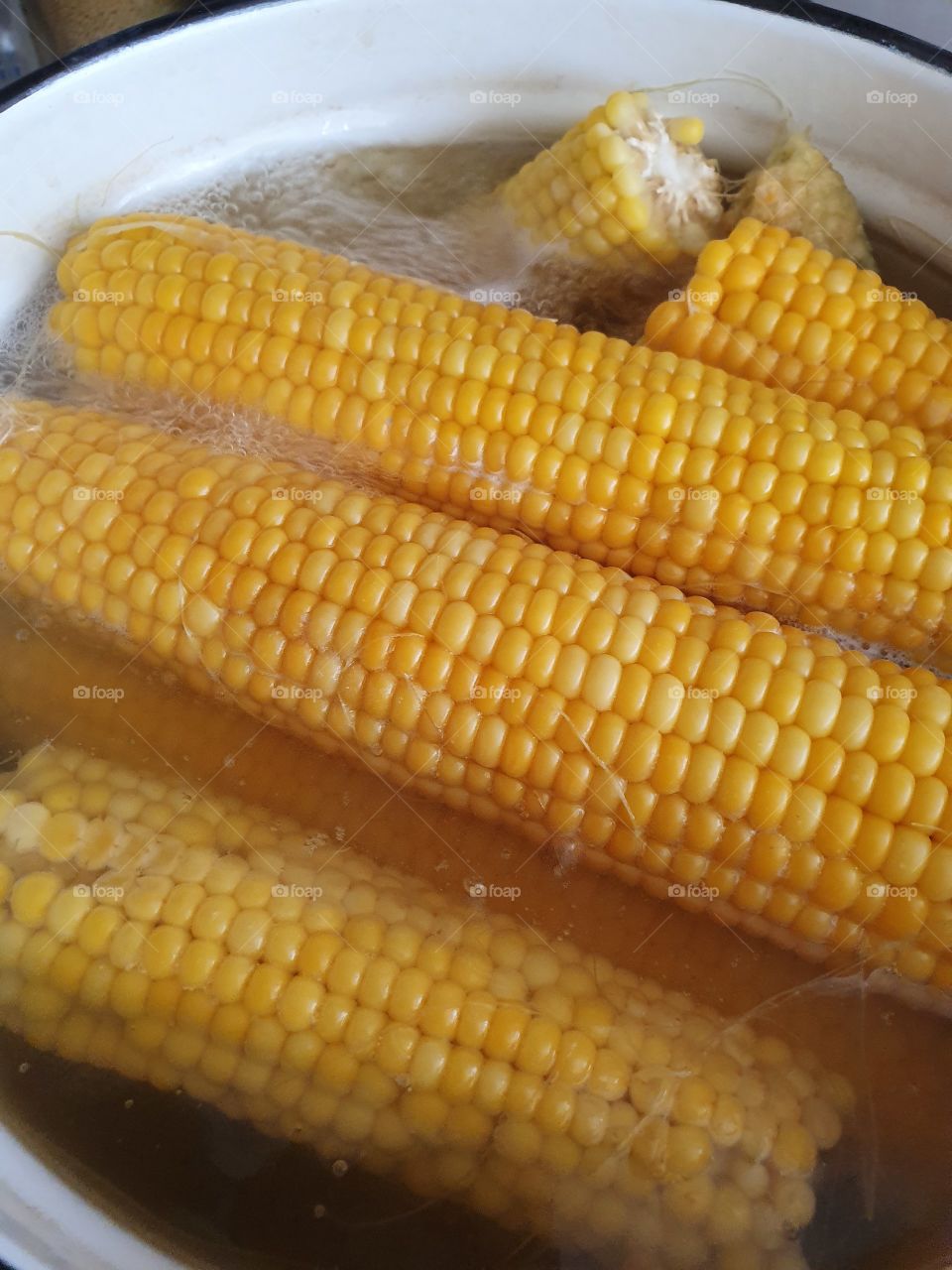 corn boiling in the pot