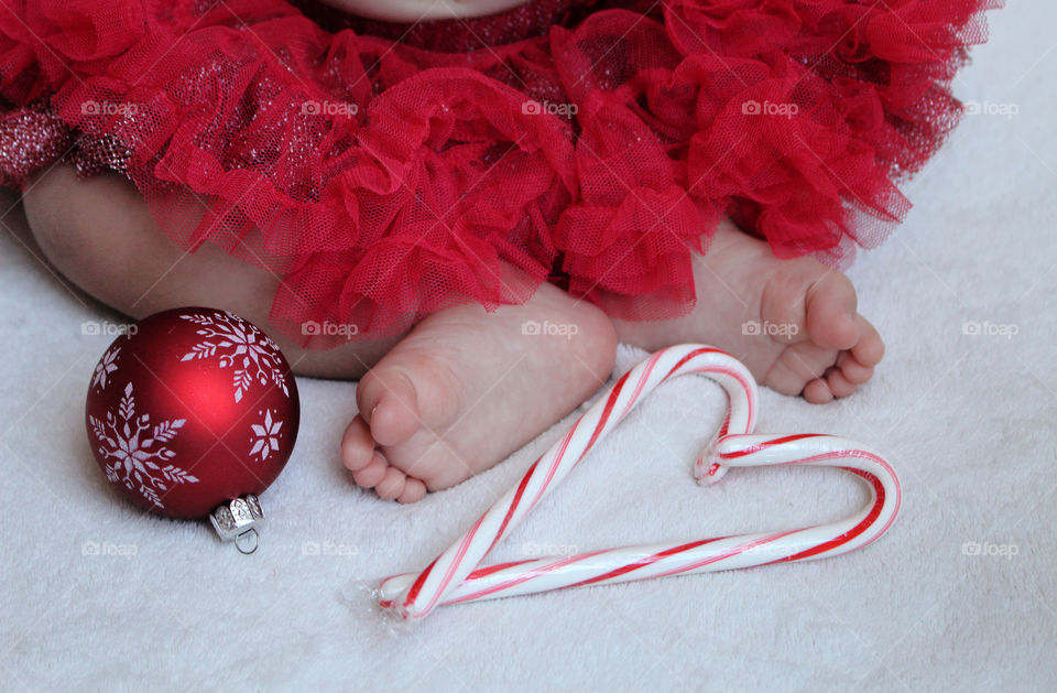 baby girl wearing red tutu