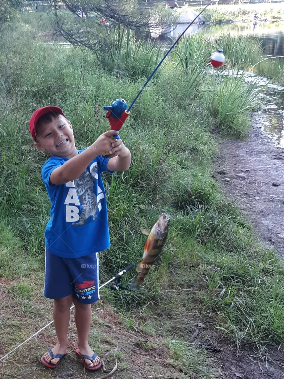 Little Boy Caught His First Fish
