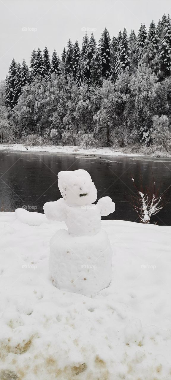Snowman in the mountains