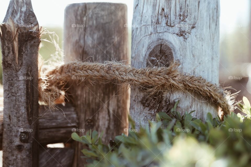 Old vintage rope around wood