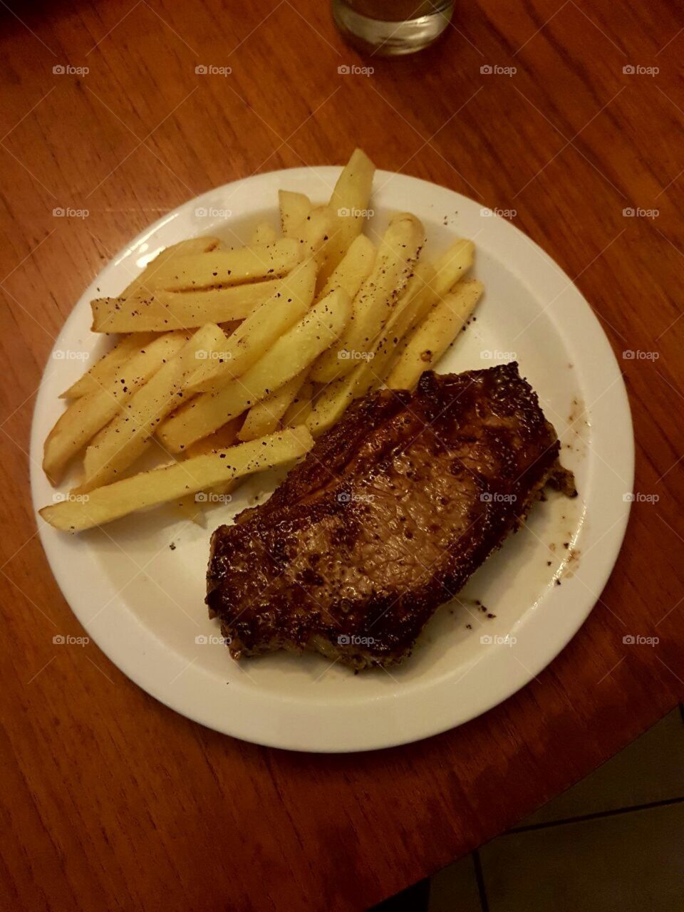 A staple diet of steak and potato chips. Greasy but good :)