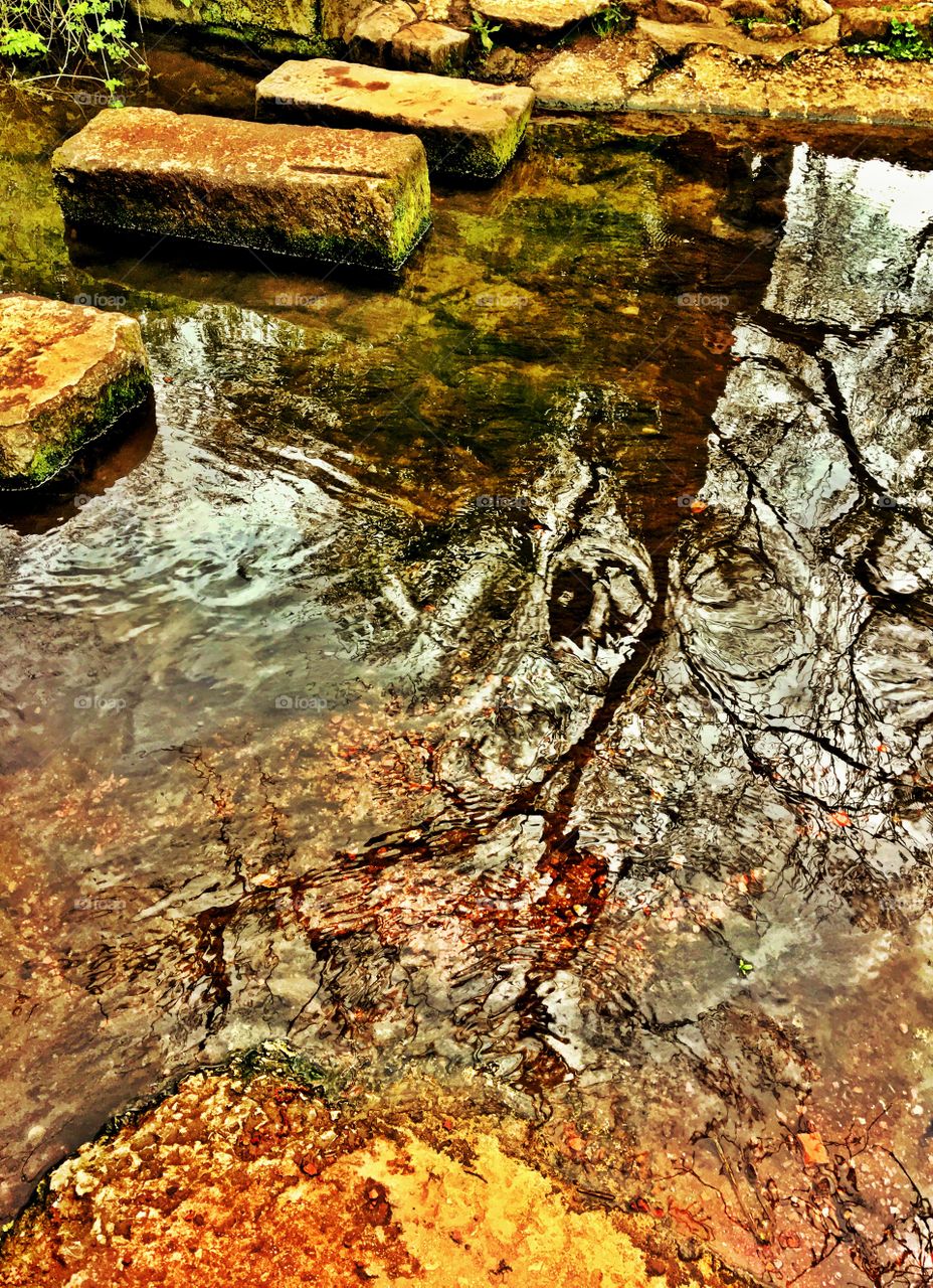 Stepping stones over a river
