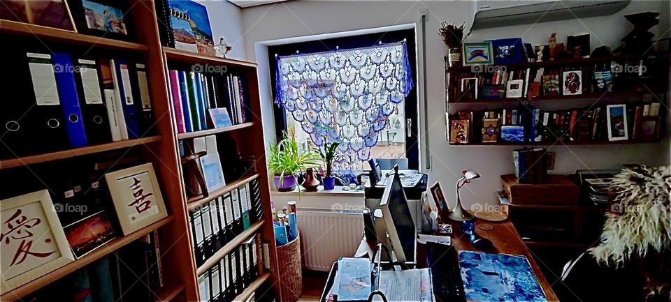 This is the work and study room of the house in „Bavaria“, Germany seen from the other side. Behind the beautiful curtains is a view of the garden. 2023. Hypnotic Productions