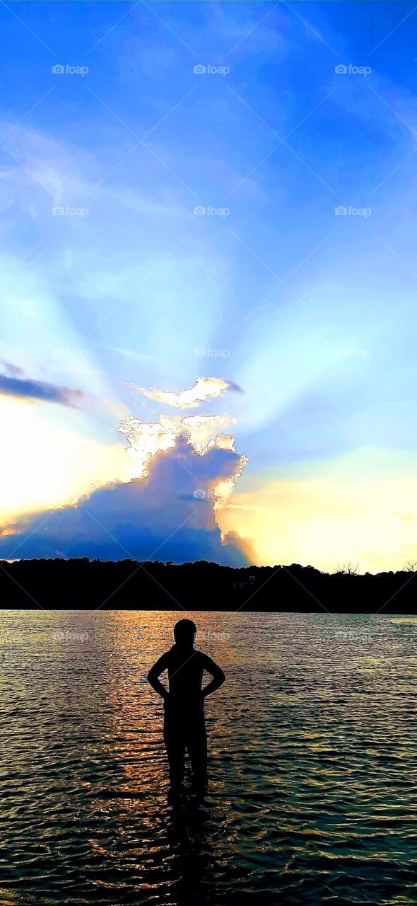 enjoying the sunset in silhouette fashion