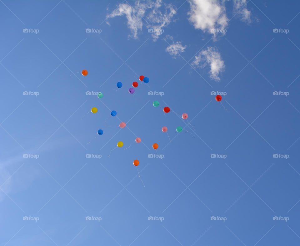 colour balloons in the blue sky clouds