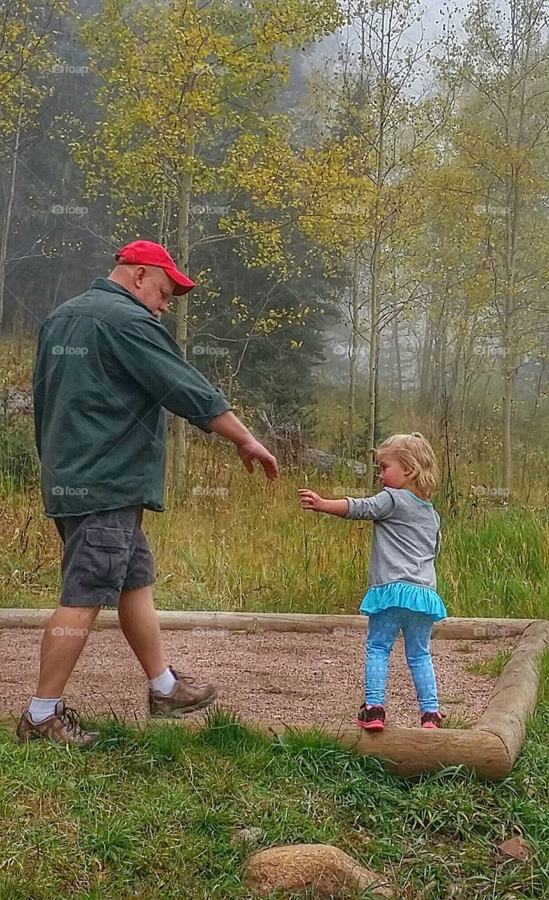 Take my hand. Grandpa with Granddaughter