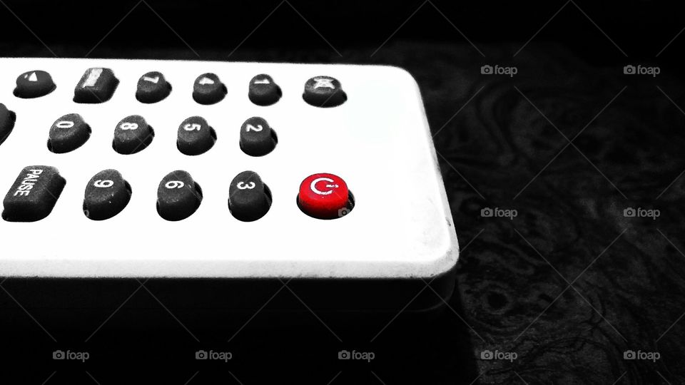 remote control on black background