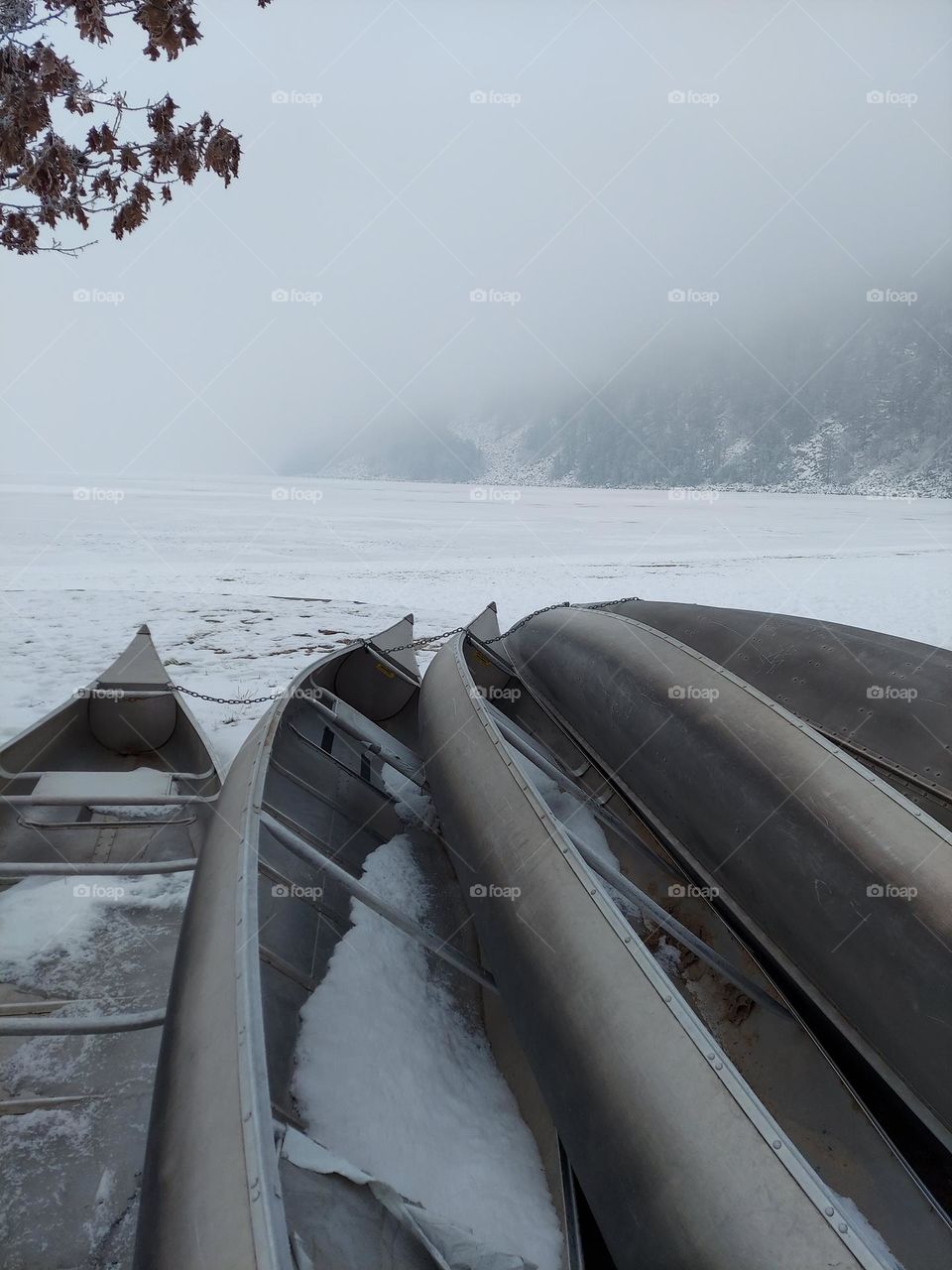Canoes waiting for Summer and tourists.