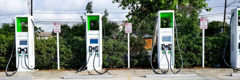 Multiple electric car charging stations in a row