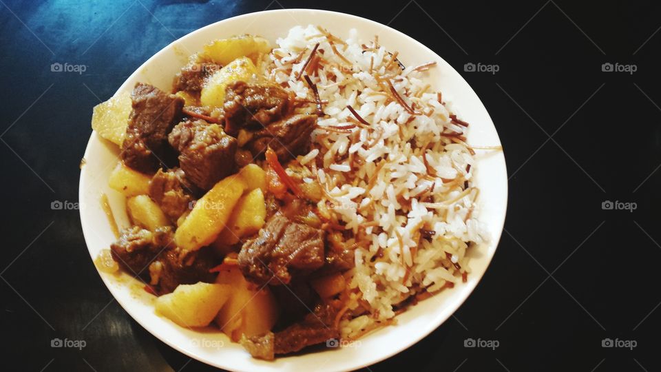 ECUADORIAN FOOD,BEEF WITH WILD RICE.