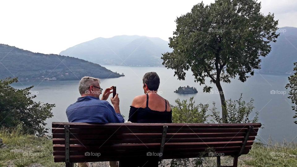 admiring and snapping the lake