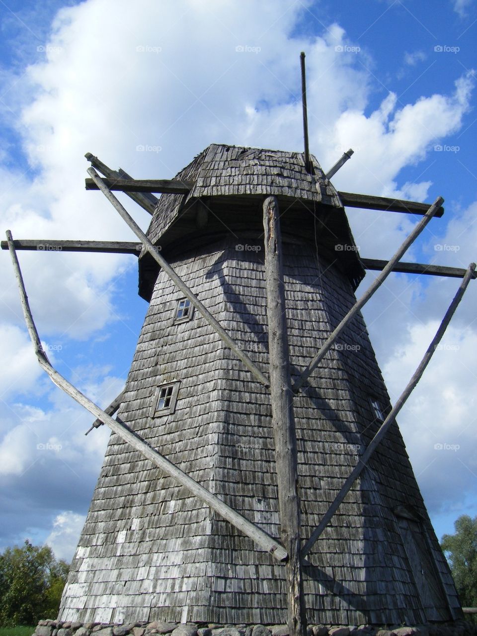 Old windmill and clouds