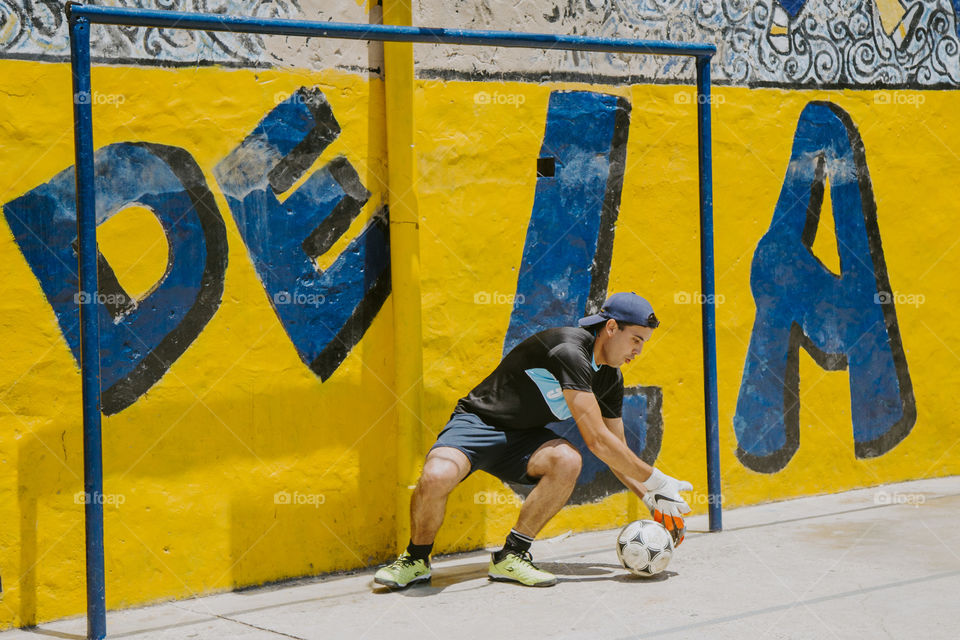 Playing soccer 