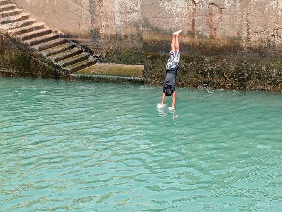 beautiful jump in summer into sea